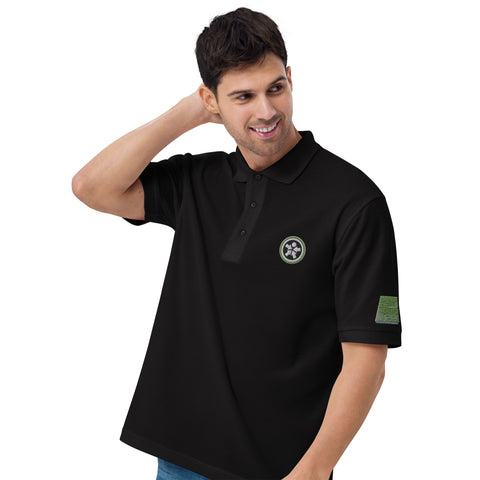 Image of A man wearing a Boss Uncaged Men's Premium Polo shirt with the Boss Uncaged Store logo.