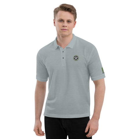 Image of A man wearing a Boss Uncaged Men's Premium Polo shirt and black pants from the Boss Uncaged Store.