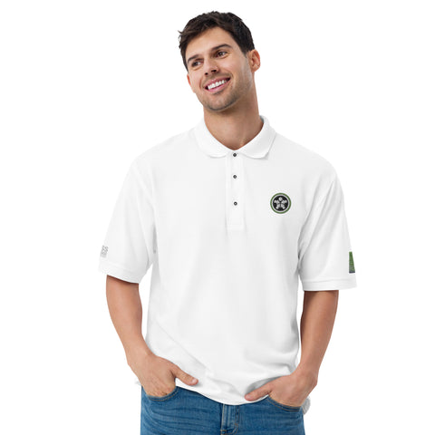 Image of A man is smiling while wearing a Boss Uncaged Men's Premium Polo shirt from the Boss Uncaged Store.