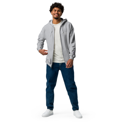 Image of A man in a Boss Uncaged Breakthrough Hoodie and jeans posing for a photo.