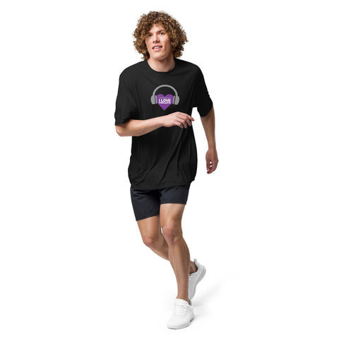 A man wearing an Affirmation I Love Podcasts - Boss Uncaged Unisex performance crew neck t-shirt and shorts is running.