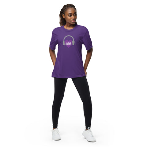 A woman wearing purple leggings and an Affirmation I Love Podcasts - Boss Uncaged Unisex performance crew neck t-shirt from the Boss Uncaged Store.