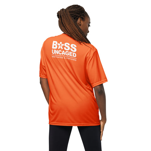 The back of a woman wearing an orange t-shirt that says Affirmation I Love Podcasts - Boss Uncaged Unisex performance crew neck t-shirt from the Boss Uncaged Store.