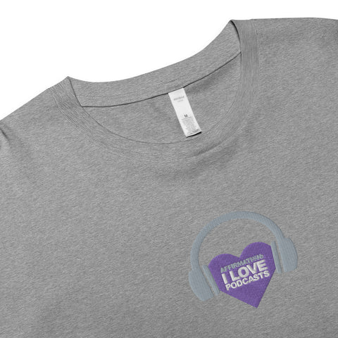 A grey "Affirmation I Love Podcasts - Women's crop top" with headphones and a purple heart, designed for fans of podcasts and the Boss Uncaged Store.