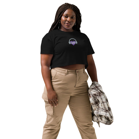 A woman wearing an Affirmation I Love Podcasts - Women’s crop top by Boss Uncaged Store and khaki pants.