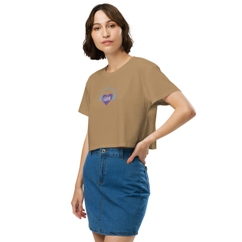 A trendy Boss Uncaged Store podcast enthusiast wearing an Affirmation I Love Podcasts - Women’s crop top.