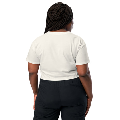 The stylish back view of a woman wearing the Affirmation I Love Podcasts - Women’s crop top from Boss Uncaged Store and black pants.