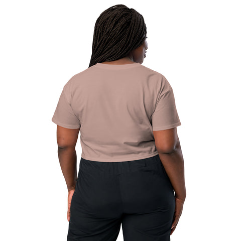 An empowering vision of a Boss Uncaged woman confidently flaunting an Affirmation I Love Podcasts - Women’s crop top paired with stylish black pants.