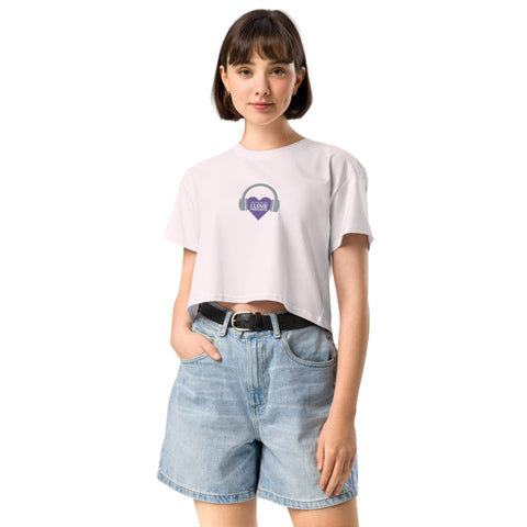 A trendy and fashionable woman wearing an Affirmation I Love Podcasts - Boss Uncaged Store crop top.