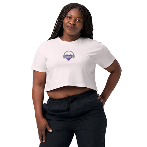 A woman posing for a picture while wearing an Affirmation I Love Podcasts - Women’s crop top from Boss Uncaged Store.