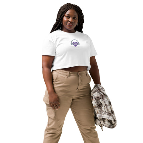 A trendy woman wearing an Affirmation I Love Podcasts - Women's crop top from Boss Uncaged Store and khaki pants.