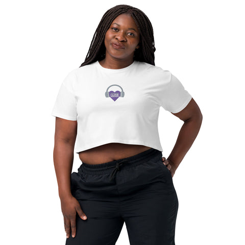 A woman posing for a picture wearing an Affirmation I Love Podcasts - Women’s crop top from Boss Uncaged Store.