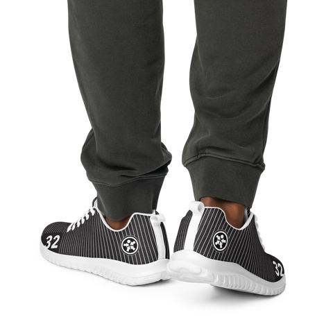 Image of A man wearing a pair of Boss Uncaged Workflow Athletic Shoes (Black) from Boss Uncaged Store.