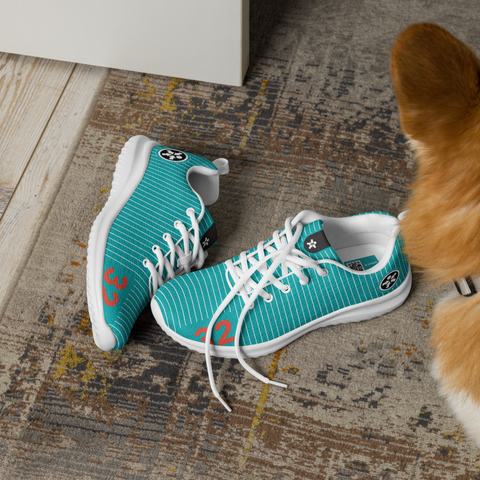 Image of A dog is standing next to a pair of Boss Uncaged Workflow Athletic Shoes (Teal) from the Boss Uncaged Store.
