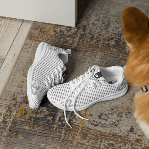 Image of A corgi standing next to a pair of Boss Uncaged Workflow Athletic Shoes (White) from the Boss Uncaged Store.
