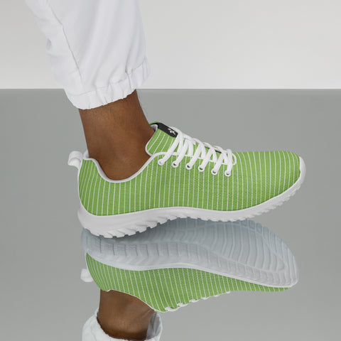 Image of A woman wearing Boss Uncaged Workflow Athletic Shoes (Green) from the Boss Uncaged Store on a reflective surface.