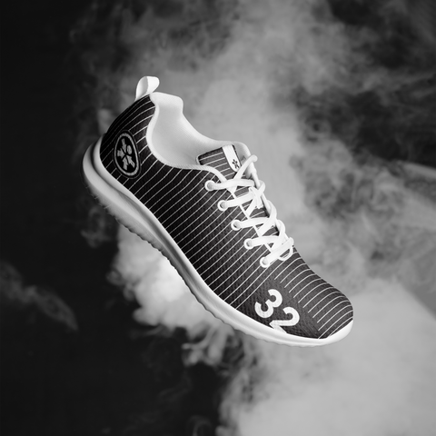 Image of A black and white image of the Boss Uncaged Workflow Athletic Shoes (Black) by Boss Uncaged Store in the air.