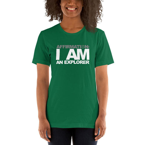 Image of A woman wearing a green t-shirt from Boss Uncaged Store that says AFFIRMATION: “I AM AN EXPLORER”.