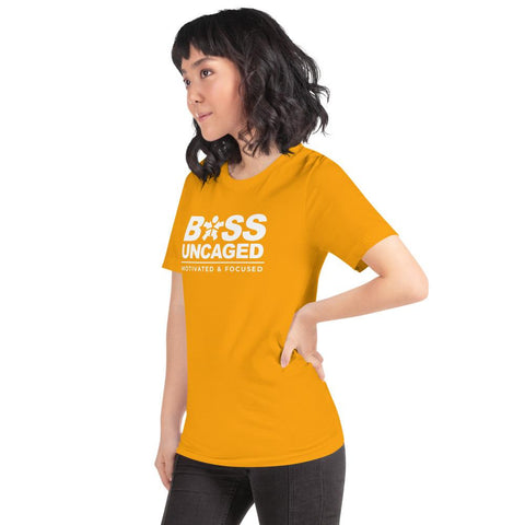 Image of A woman wearing a yellow t-shirt that says "Boss Uncaged Motivated and Focused" from the Boss Uncaged Store.