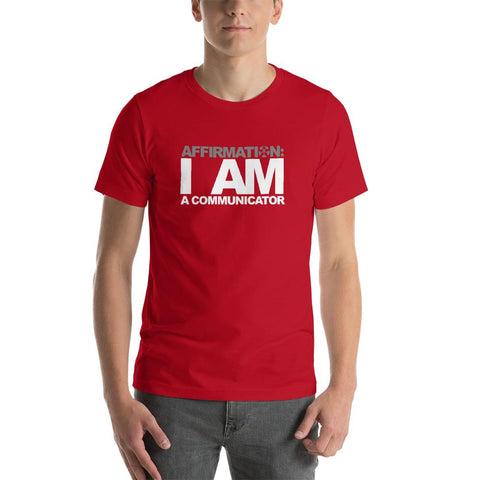 Image of A man wearing a red t-shirt from Boss Uncaged Store that says "AFFIRMATION: 'I AM A COMMUNICATOR.'