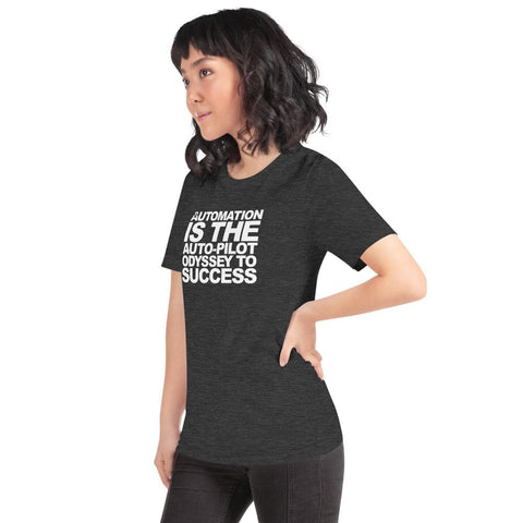 Image of A person with shoulder-length curly hair is wearing a dark T-shirt from the brand Buteke that features the text "AUTOMATION IS THE AUTO-PILOT ODYSSEY TO SUCCESS.