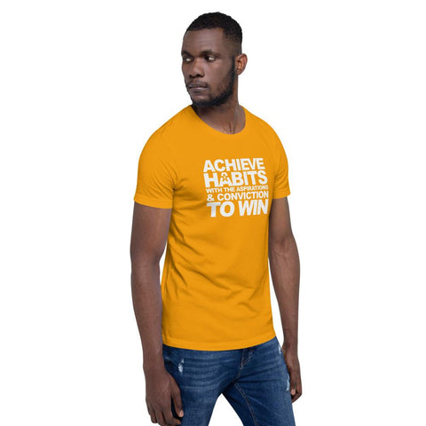Image of A man wearing a yellow t-shirt that says "ACHIEVE HABITS WITH THE ASPIRATIONS AND CONVICTION TO WIN." by Boss Uncaged Store.