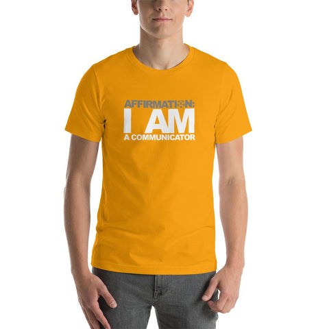 Image of A man wearing an orange t-shirt that says "AFFIRMATION: I AM A COMMUNICATOR" from the Boss Uncaged Store.