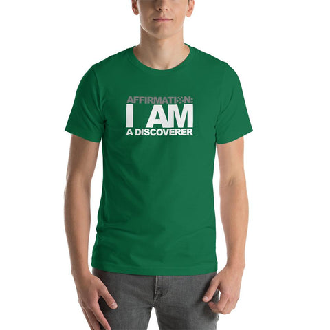 Image of A man wearing a green t-shirt that says "AFFIRMATION: I AM A DISCOVER" from Boss Uncaged Store.