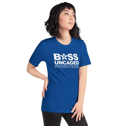 Image of A woman wearing a blue t-shirt that says "Boss Uncaged Motivated and Focused" from the Boss Uncaged Store.