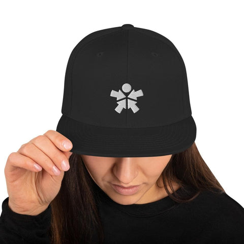 Image of A woman wearing a "Boss Uncaged" Snapback Hat with a white snowflake on it from the Boss Uncaged Store.
