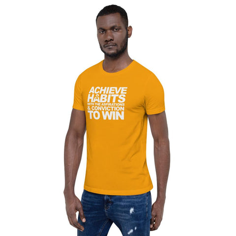 Image of A man wearing an orange t-shirt that says "ACHIEVE HABITS WITH THE ASPIRATIONS AND CONVICTION TO WIN." from Boss Uncaged Store.