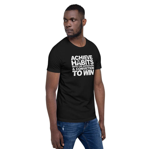 Image of A man wearing a black t-shirt that says "ACHIEVE HABITS WITH THE ASPIRATIONS AND CONVICTION TO WIN" from Boss Uncaged Store.