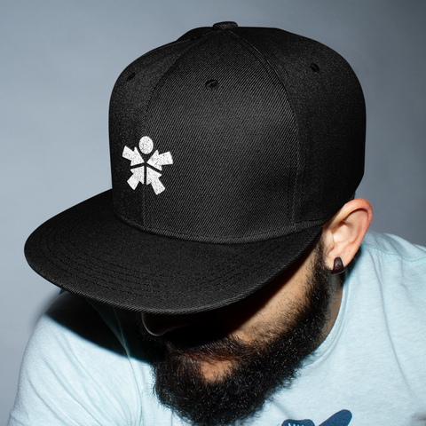 Image of A man with a beard wearing a "Boss Uncaged" Snapback Hat from the Boss Uncaged Store.