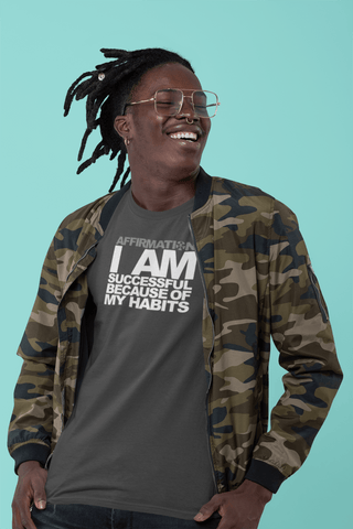 Image of I am wearing the Boss Uncaged Store AFFIRMATION: “I AM SUCCESSFUL BECAUSE OF MY HABITS” unisex t-shirt.